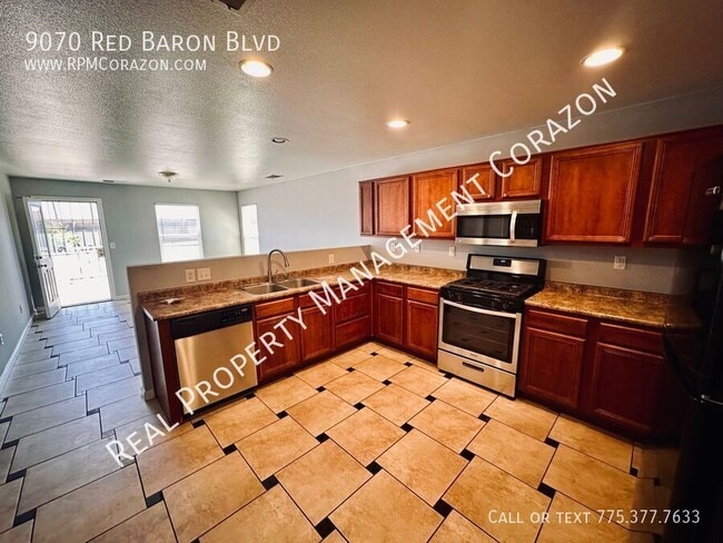 Building Photo - 9070 Red Baron Blvd