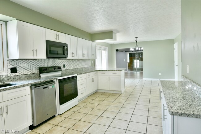 Building Photo - 5794 Merwin Chase Rd