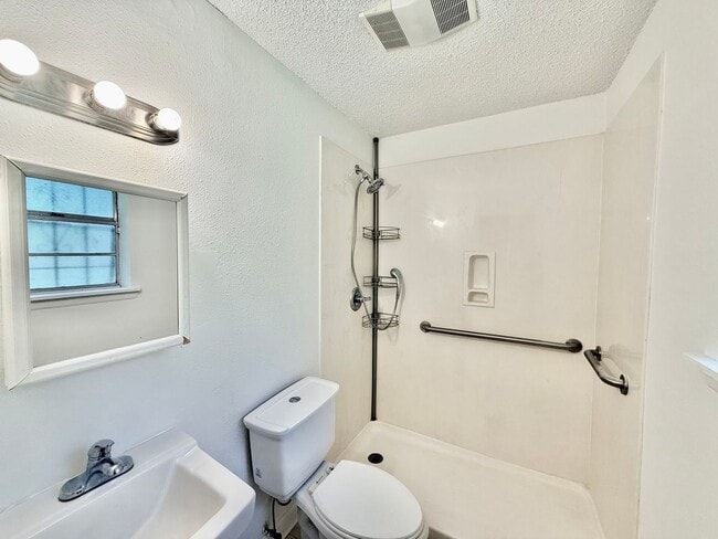 Building Photo - Charming 3BR/2BA Brick Home in Perkins Village – Spacious Yard & Cozy Fireplace