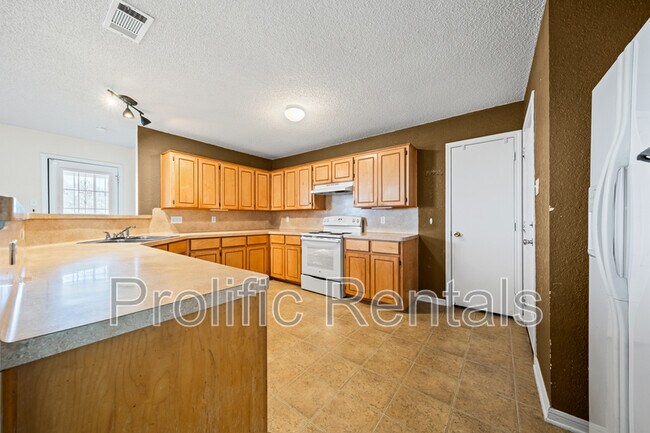 Building Photo - 3211 Tom Lockett Dr
