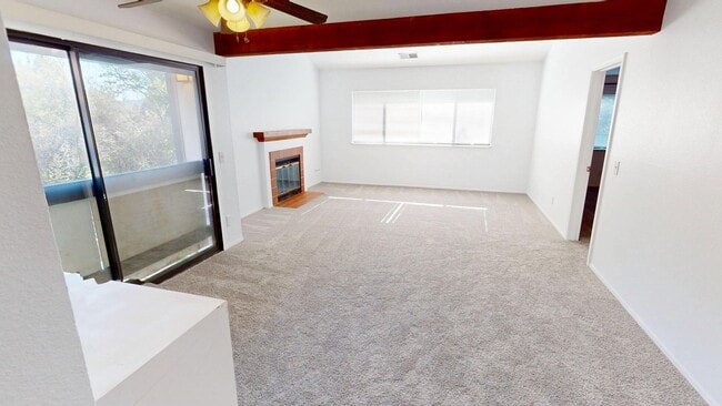 Building Photo - Update 2x2 Top Floor Condo with pool, storage, fireplace & garage in ideal Novato Location