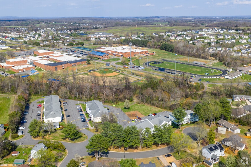 Community Context? / Aerial - Woodscape Apartments
