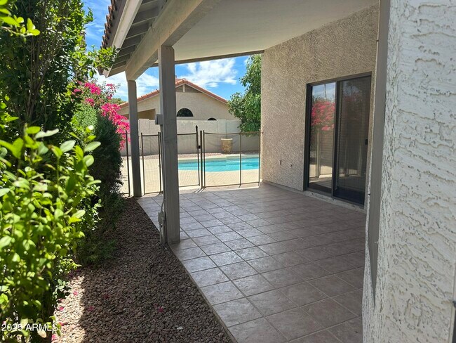 Building Photo - 8889 E Aster Dr