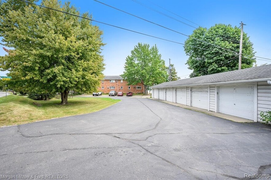 View of Parking Lot and Detached Garage Space - 5375 Cooley Lake Rd