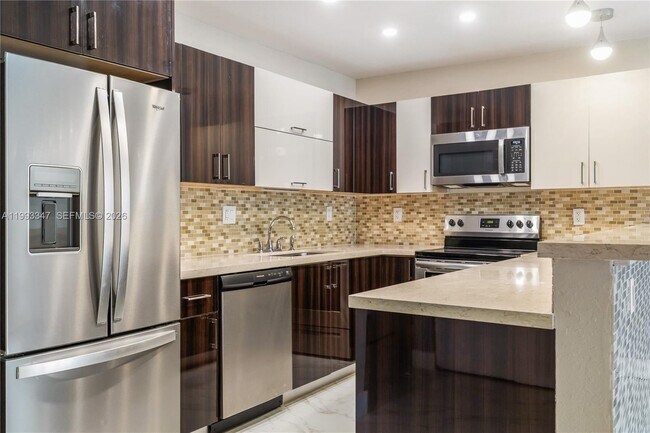 Building Photo - 19380 Collins Ave