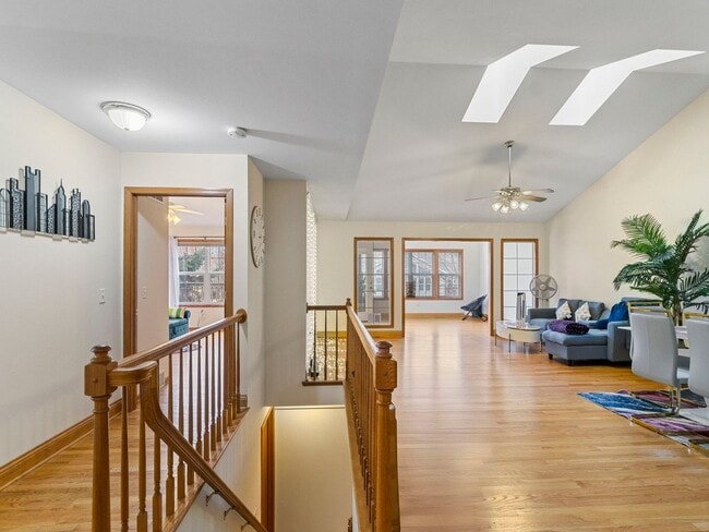 Building Photo - Spacious 3BR/3BA Condo with Finished Basement + 2-Car Garage — Available Now