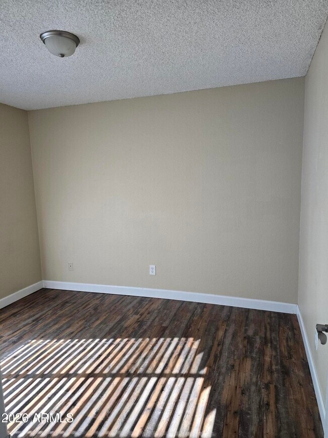 Building Photo - 9002 W Roma Ave