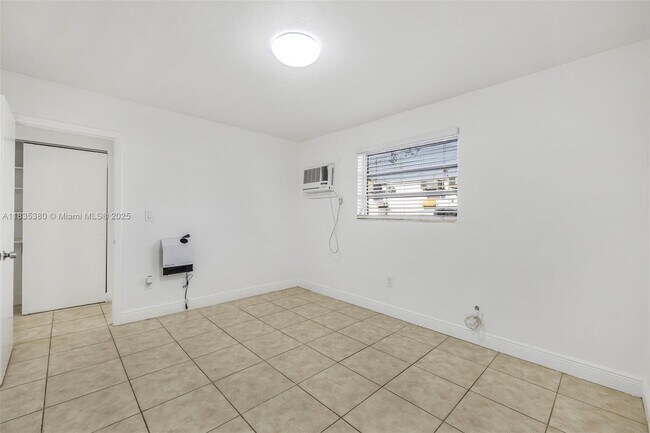 Building Photo - 7130 W 11th Ct