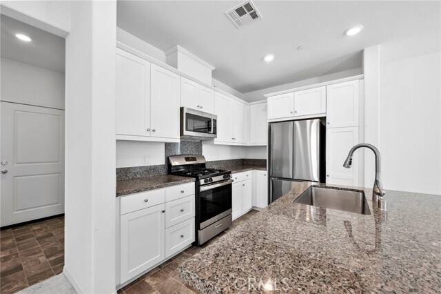 Building Photo - 34495 Agave Dr