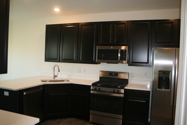Kitchen - Chocolate Tall Cabinets - 1129 Hawk Hollow Dr