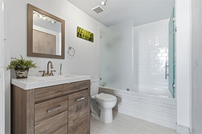 Building Photo - 690 SW 1st Ct