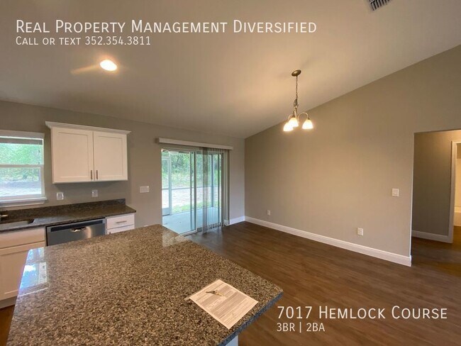 Building Photo - 7017 Hemlock Course
