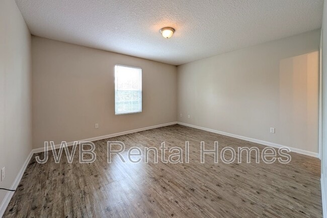 Building Photo - 8445 McGirts Village Ln