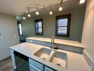 Building Photo - Downtown living at its finest. Limited tim...