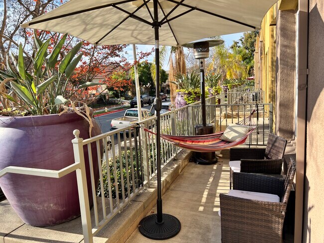 Patio/Porch area in front of the unit with plenty of sun and privacy - 89 E Commonwealth Ave