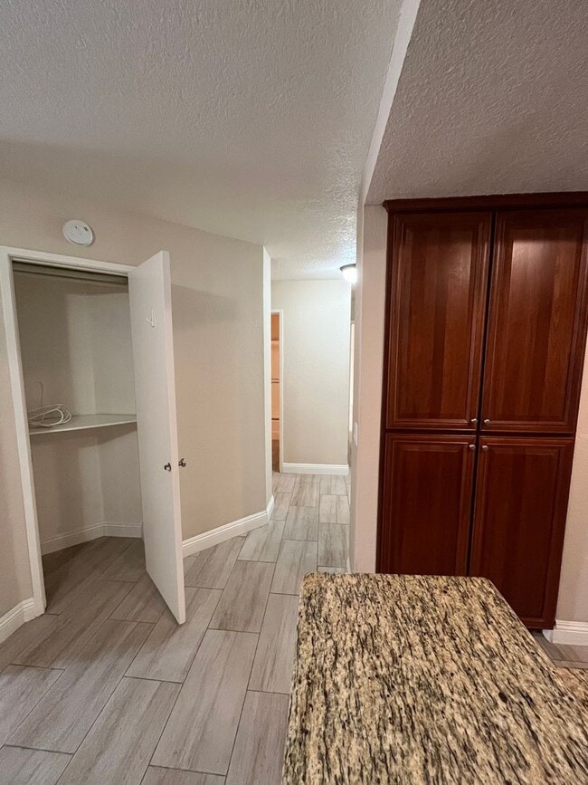 Building Photo - BEAUTIFULLY UPGRADED 1 STORY CONDO