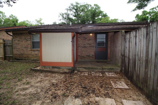 Building Photo - Brick Duplex Near NAS Pensacola & Corry Station with Tile Flooring Throughout and Fully Fenced Ba...