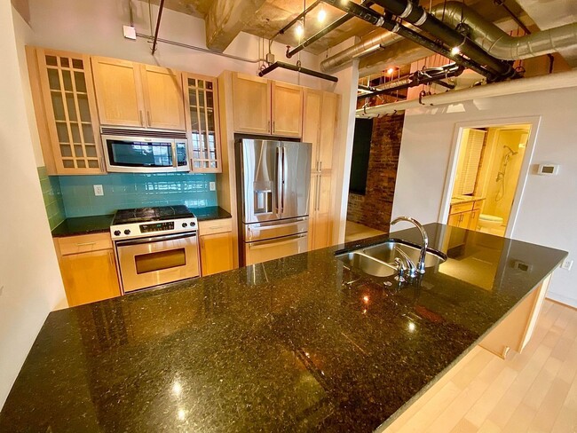 Building Photo - Stunning Industrial-Contemporary One Bedro...