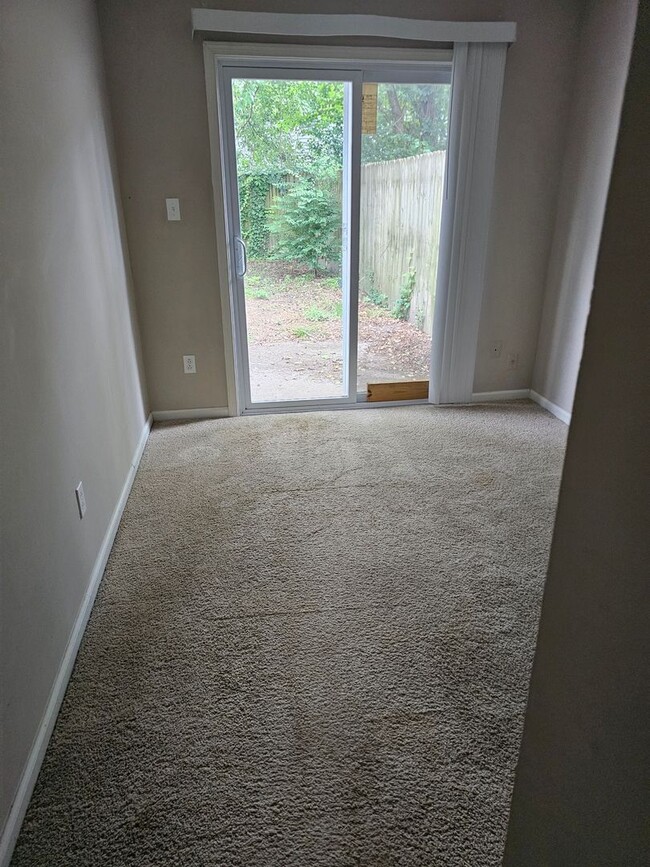 Building Photo - Cozy two-bedroom single-story townhouse