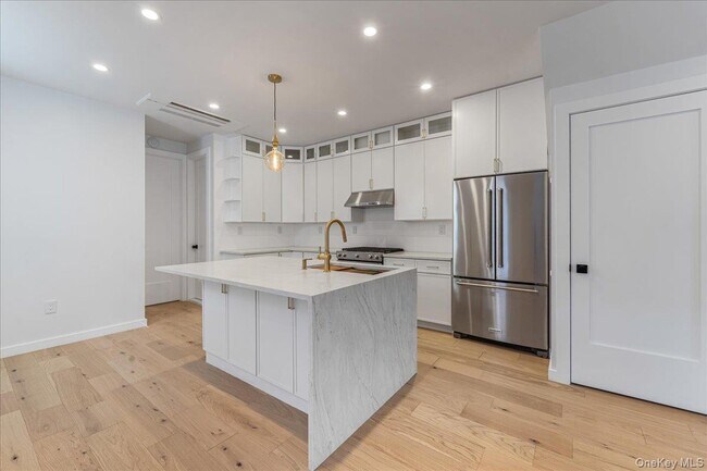 Building Photo - 36-34-36-11 11th St