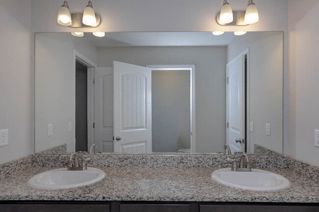 Building Photo - 4BR/3.5BA · 2,809 SF · Owner's Suite on Main · Fenced Yard · Midland, GA — $2,800/mo
