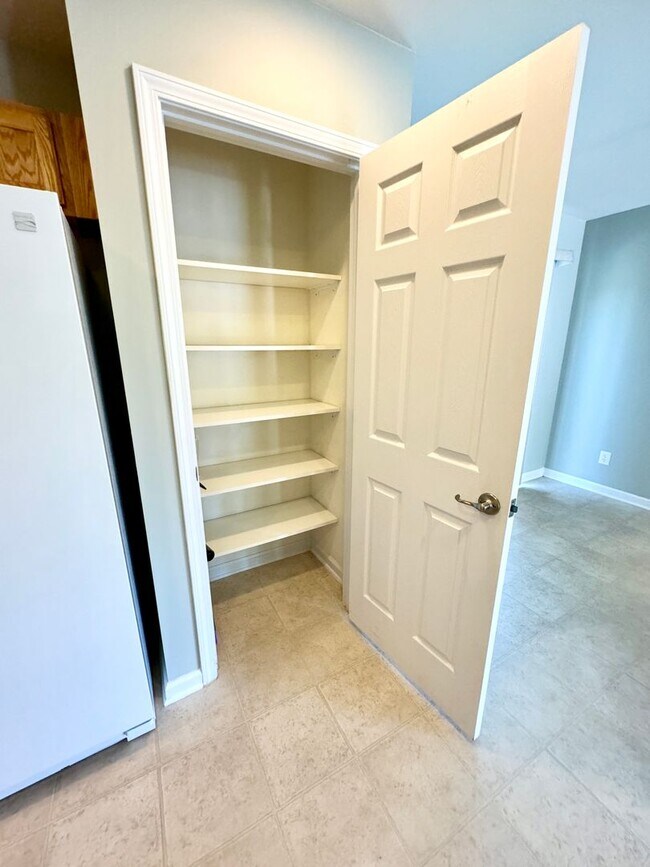 Building Photo - Like New 3 Bedroom & 2 Bath pond front home in Hillsborough! Enjoy the Community Pool, Playground...