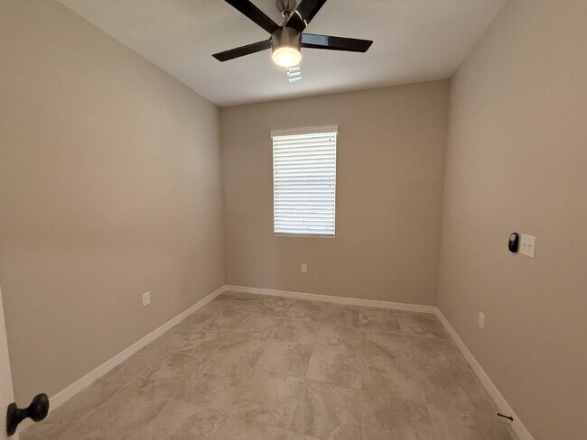 Building Photo - Spacious 4-Bedroom Retreat with additional office/den in the Heart of Trinity!