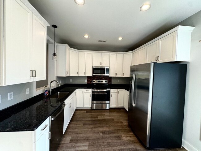 Building Photo - 1ST MONTH RENT FREE - END UNIT Sunburst Villa Luxury Townhouse WITH BASEMENT