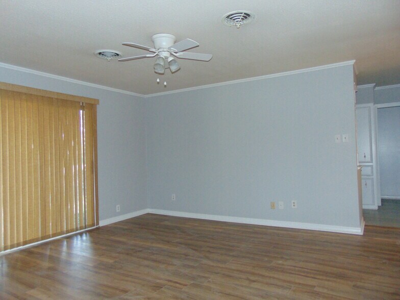 Master bedroom. 3 closets. Built in cabinets and drawers galore. room measures 18 x 15, access to back patio and side yard. - 8642 W Wilderness Way