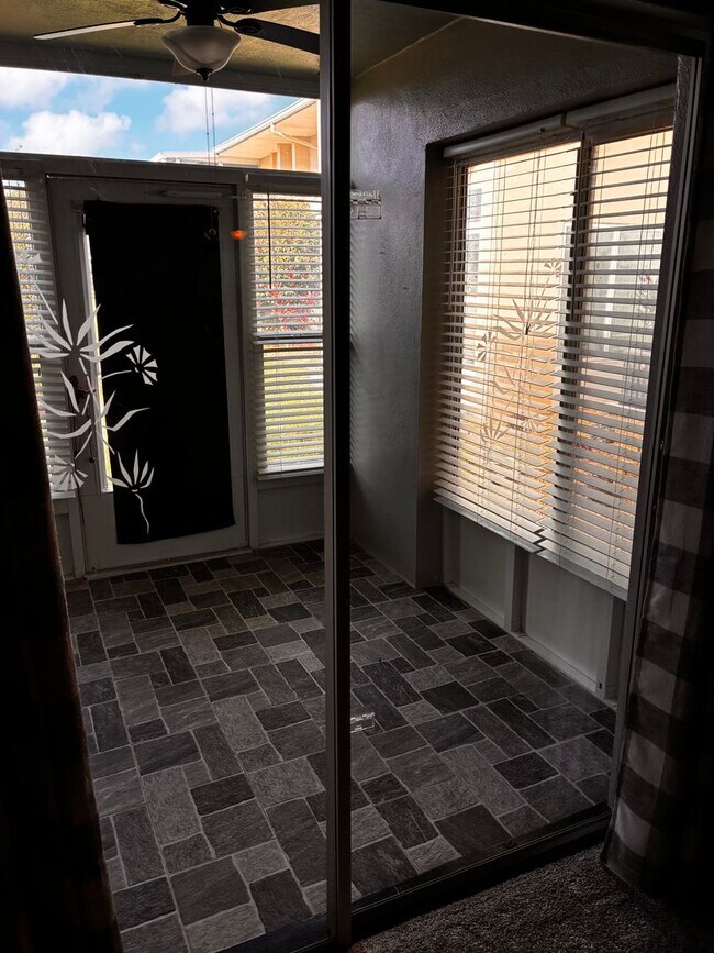 Building Photo - 55+ Charming first-floor condo nestled in the serene Fairways 3 Condominiums