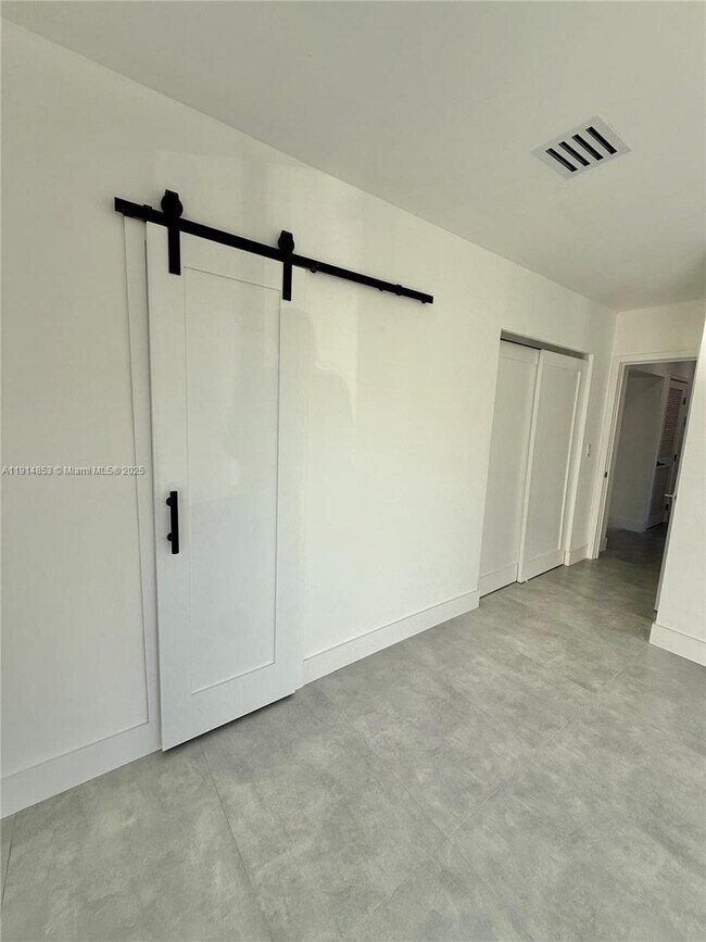 Building Photo - 12615 N Miami Ave