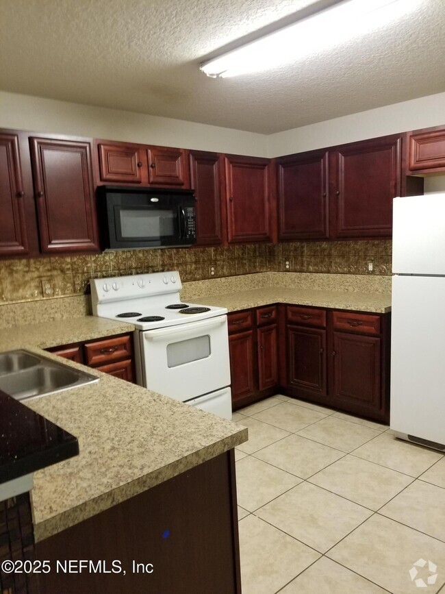 Building Photo - 6965 Ortega Woods Dr