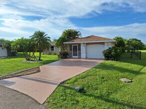Building Photo - "Charming 4-Bedroom Oasis with 3 Full Bath...