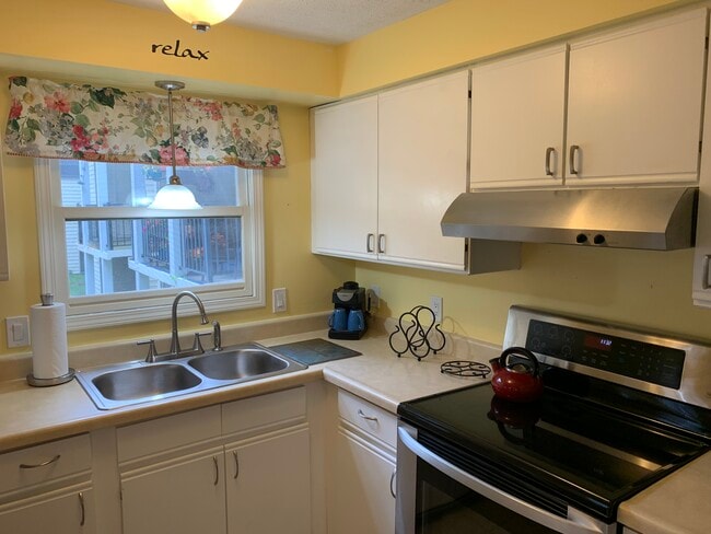 kitchen with new appliances - 4244 Mitchell Creek Dr