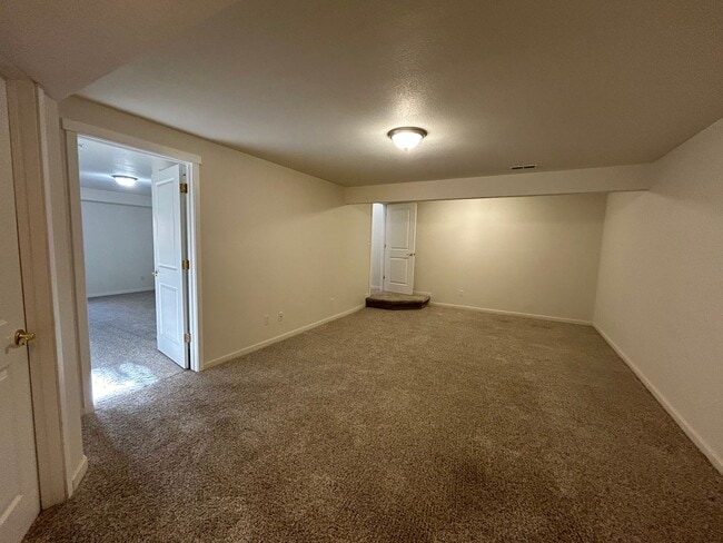 Building Photo - Stylish, Spacious 3 Bedroom Townhome with Two-Car Garage