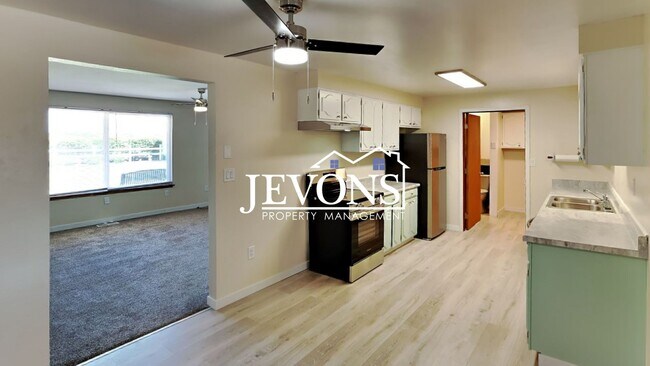 Building Photo - Water and sewer included! Comfortable 3-be...
