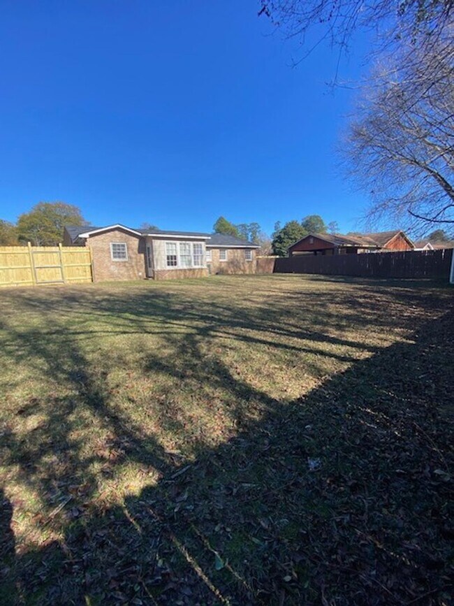 Building Photo - A Quiet Location, $200 Move-N-Special