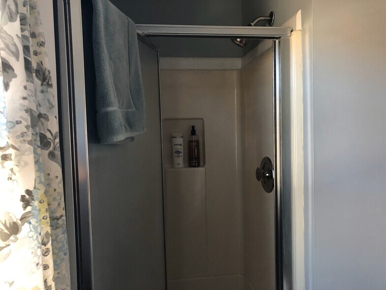 Bathroom with stall shower - 719 W 2nd St