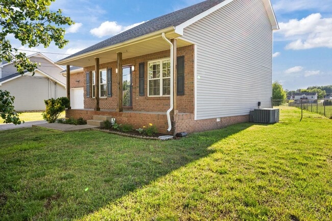 Building Photo - Charming Brick Home with Soaring Ceilings & Updated Finishes!