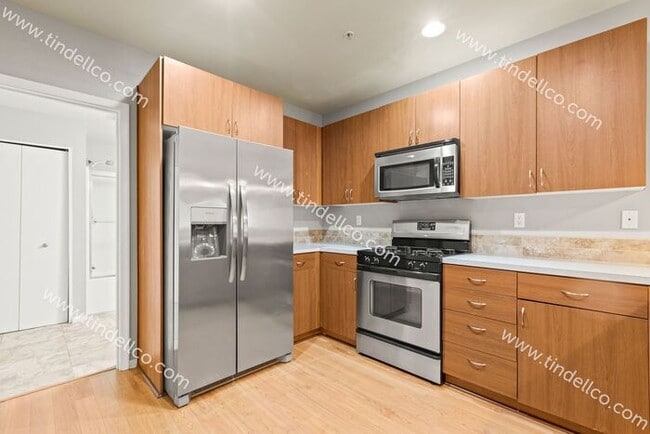 Building Photo - Luxurious 1BR/1BA Condo in Matthew Frank Community - Your Ideal Urban Retreat! (W/S/G included)