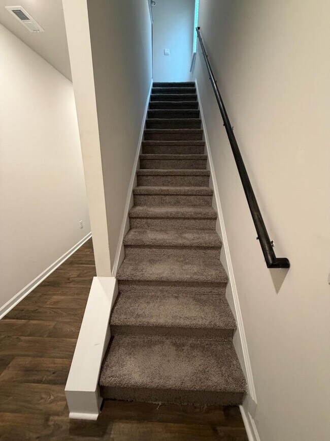 Building Photo - Brand new 3 bedroom townhome available for immediate move in!