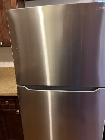 Brand new stainless steel refrigerator - 2458 S Normandie Ave