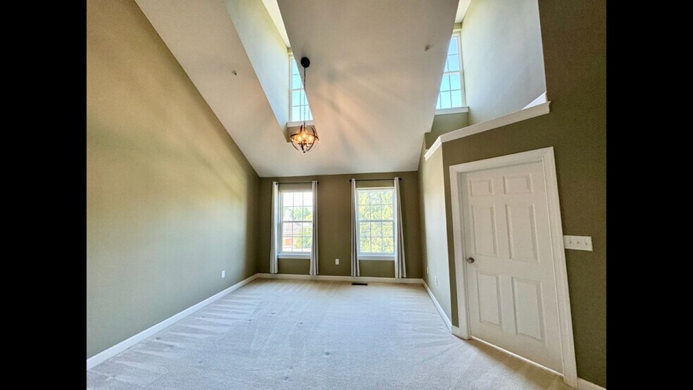 Bedroom 4 (primary suite, upper level) - 9403 Aston Villa