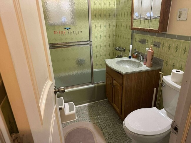 Building Photo - 26-28-28 96th St