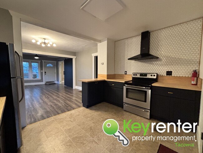 Building Photo - Cozy 4 Bedroom Tacoma Rental Home Near Lincoln District and Downtown