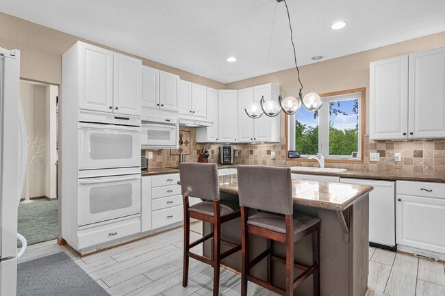 Building Photo - Luxury 4-Bed Retreat with In-Ground Pool & 3-Car Garage