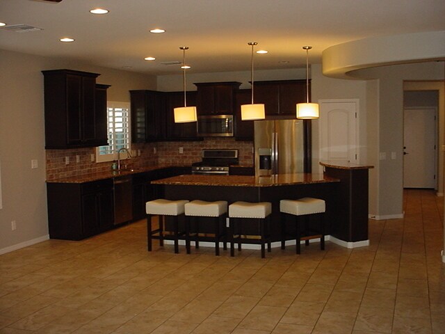 Building Photo - Stunning Fireside at Desert Ridge home with resort style back yard.