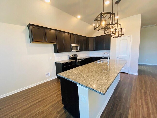 Building Photo - 5205 Leaning Tree