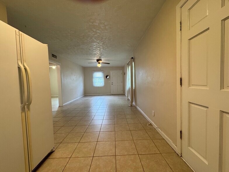View from kitchen into living/dining room and front door - 405 Upper 8th Avenue South