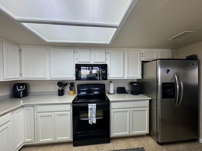 Building Photo - Riverfront 2BR 2BA Furnished Condo on GROUND LEVEL W/Garage and UTILITIES Included AVAIL 4/1/26